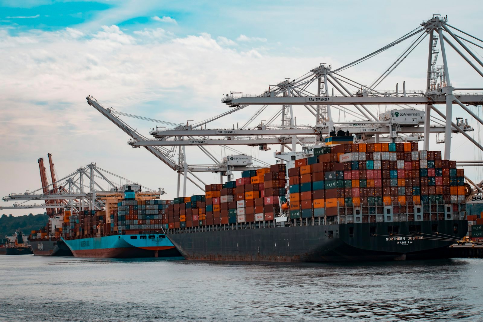 Container ship being loaded at port